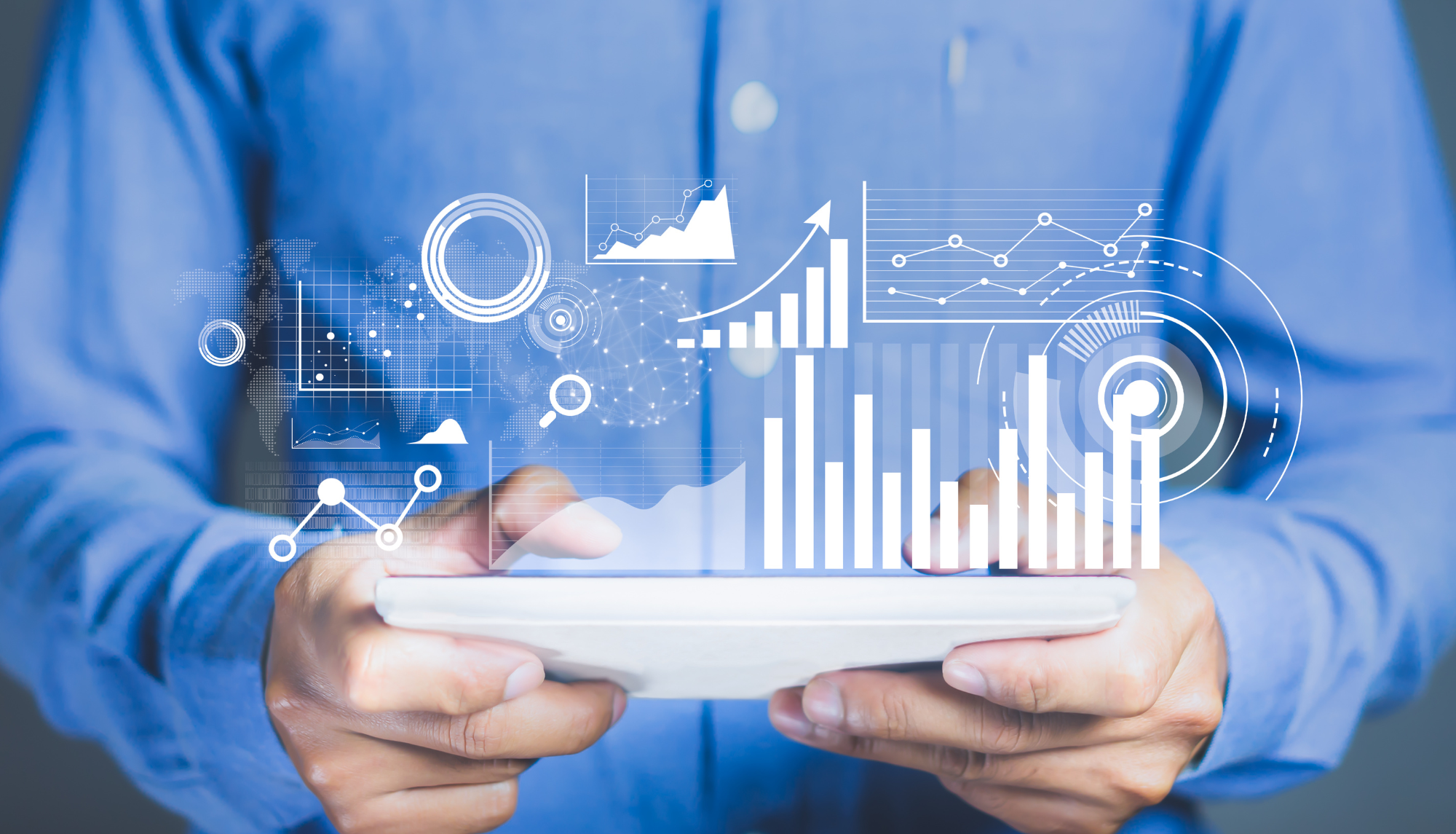 A small business owner working remotely, surrounded by charts and graphs, outsourcing analytics and insights