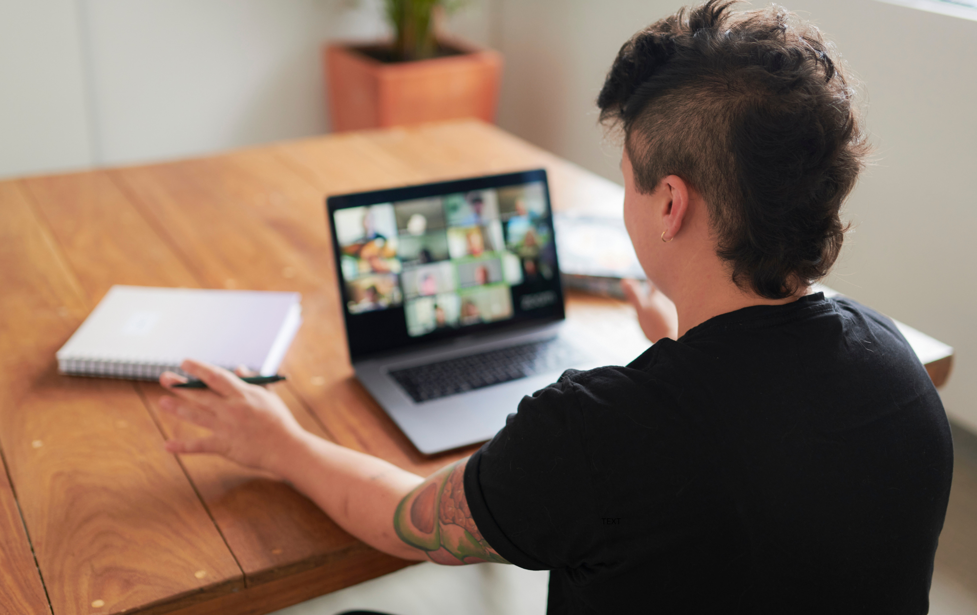 A small business owner uses remote workforce technology to provide seamless customer service from a home office