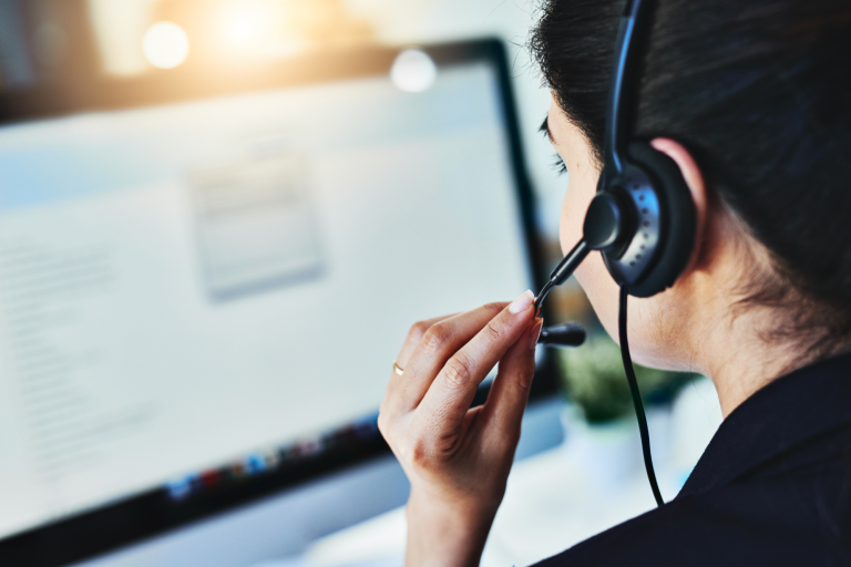 Managed Service Provider, Small Business Solutions for Remote Work Success A small business owner working from home while a managed service provider remotely monitors and maintains their business network and systems