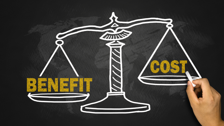 A small business owner using cost-effective IT solutions to manage their remote business operations