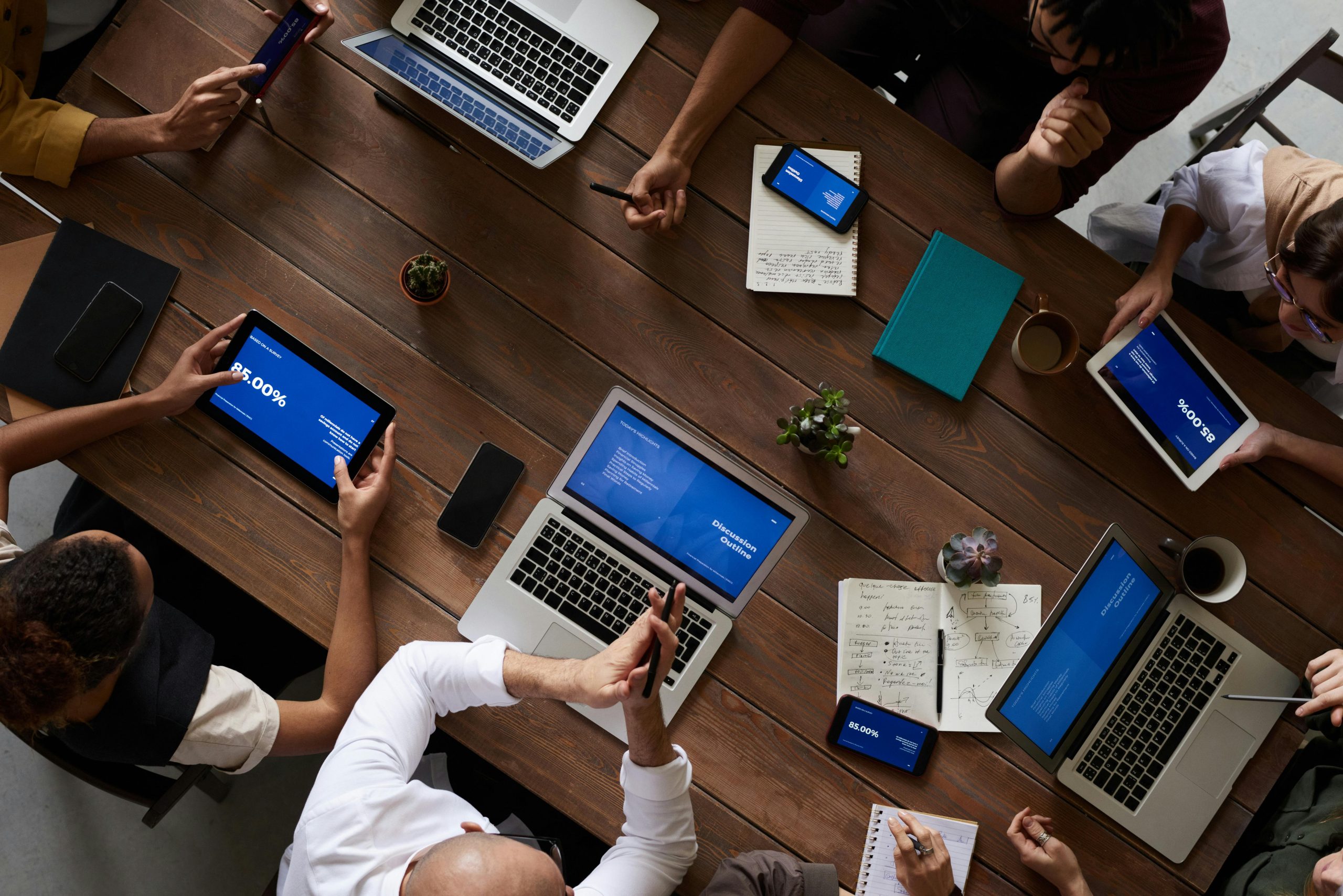 A small business owner integrates collaboration tools with existing systems in a modern office setting